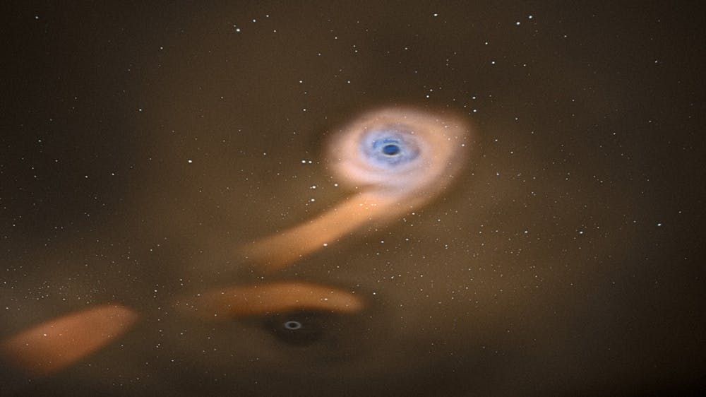 Artist’s impression of a pair of black holes. One of them is accreting the debris of the disrupted star, while the second is temporarily interrupting the stream of gas toward the other black hole. ESA/C. Carreau